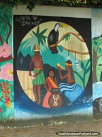 Wall mural of indigenous natives and a tucan in Tena. Ecuador, South America.
