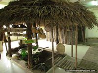 Jungle hut of the Achuar - an Amazonian community, Puyo museum. Ecuador, South America.