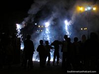 Larger version of The locals of Vilcabamba enjoy the festival fireworks.