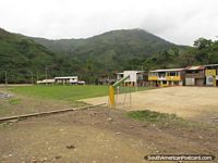Houses and soccer field in a town north of Zumba. Ecuador, South America.