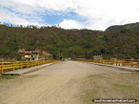 The border bridge from Pucapamba in Ecuador to La Balza in Peru. Ecuador, South America.