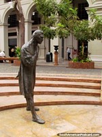 Lone figure in the middle of the 'La Fragua de Vulcano' monument in Guayaquil. Ecuador, South America.