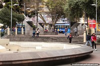 Parque 12 de Noviembre with fountain in the Ambato city center. Ecuador, South America.