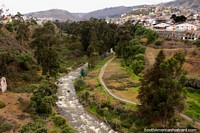 View from the bridge Puente Juan Leon Mera in Ambato, the valley and river. Ecuador, South America.