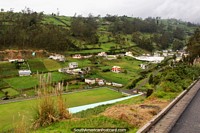 Ecuador Photo - Views of houses in a valley on the journey from Ambato to Guaranda.