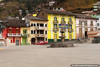 Ecuador Photo - Looking across Plaza 15 de Mayo towards a bright yellow building in Guaranda.