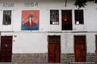 2 paintings, windows and doors at La Sociedad Alianza Obrera del Azuay building (1954) in Cuenca. Ecuador, South America.