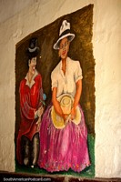 Man gives a woman a flower, nice painting on a wall inside a hallway in Cuenca. Ecuador, South America.