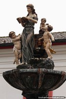 A fountain feature with 4 figures outside the government building in Pujili.