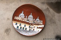 A ceramic plate with a picture of a great cathedral upon it, Pujili. Ecuador, South America.