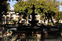 Fountain and trees in the central park in Machachi. Ecuador, South America.