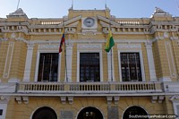 Municipal Palace and theatre, yellow historic building in Machachi. Ecuador, South America.