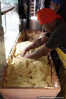 Preparation of the bizcocho mixture at San Pedro Bizcochos in Cayambe. Ecuador, South America.