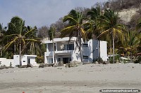 Large white house with 2 separate apartments on different levels at El Matal beach. Ecuador, South America.
