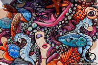 Vida do mar de simbolização de mural com um octópode, seahorse, tartaruga marïtima, estrela-do-mar e sereia em El Matal. Equador, América do Sul.