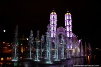 Cathedral in Portoviejo with changing light colors and fountain at night, spectacular.