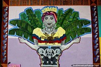 Ecuador Photo - Woman in front of a palm tree wearing a Sun God on her chest, street art in Machala.