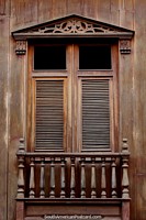 Wooden balcony, doors, windows and shutters, an icon of Zaruma. Ecuador, South America.