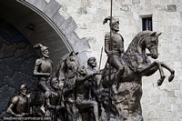 Larger version of Men on horses at the city gates in Loja, bronze-work , the mother of all monuments.