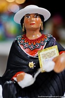 Woman in traditional clothing, arts and crafts at Almacen Artesanal Municipal, Loja. Ecuador, South America.