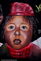 Girl with red hat and scarf, some the great street art in Zamora. Ecuador, South America.