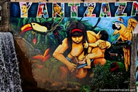 Mural assombroso de uma mulher indïgena, o seu bebê e variedade vida selvagem em Yantzaza. Equador, América do Sul.