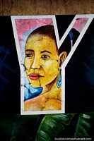 Larger version of Face of a woman depicted on the letter Y which stands for Yantzaza at the new malecon.