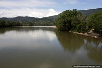 Zamora River in Yantzaza, continues south to Zamora then west to Loja, peaceful and calm waters. Ecuador, South America.