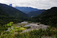 Valleys and green hills around the Pastaza River between Puyo and Banos. Ecuador, South America.