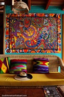 Amazing decor with pillows and a psychedelic painting, Leprechaun Bar, Banos. Ecuador, South America.