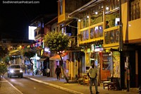 Streets of Banos at night with many restaurants and bars to enjoy. Ecuador, South America.