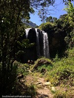 Silencio Waterfall in a beautiful setting, one of many waterfalls to see around Banos. Ecuador, South America.