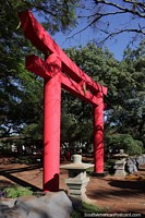 Paraguay Photo - Red gate to the Japanese gardens at the Plaza de Armas in Encarnacion.