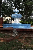 Fountain and stone lion at Plaza Mariscal Lopez in Paraguari. Paraguay, South America.