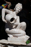 Woman pouring an urn, large ceramic artwork made in Aregua.