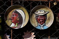 Platos con caras para colgar en la pared elaborados en cermica en Aregua. Paraguay, Sudamerica.