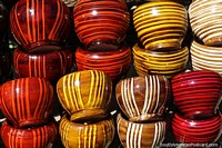 Range of colored ceramic plant holders made in Aregua. Paraguay, South America.