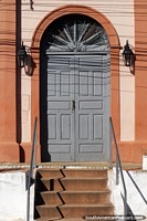 Nice doorway with lamps in San Estanislao.