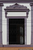 Nice decoration in purple ceramic of a building in Concepcion. Paraguay, South America.