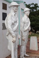 Heroes of the Chaco, monument of 2 soldiers at the port in Concepcion. Paraguay, South America.