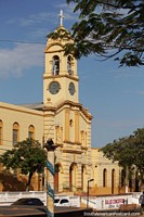 Maria Auxiliadora and San Jose Parish in Concepcion, yellow church with clock tower. Paraguay, South America.