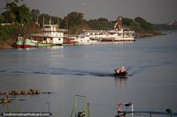 Paraguay Photo - Tugboat and passenger boats at the port in Concepcion.
