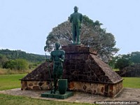 The statues of 2 men at Ybycui National Park, closeup.