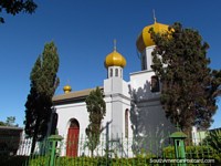 Russian church in Encarnacion - Iglesia Ortodoxa San Nicolas with yellow domes. Paraguay, South America.