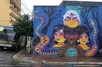 3 Paraguayan princesses and their grandma, fantastic purple mural in Asuncion. Paraguay, South America.