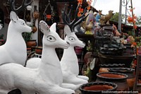 3 white ceramic reindeer, for sale in Aregua, the capital of ceramics. Paraguay, South America.