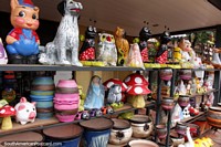 Various ceramic animals and other pieces, a shelf of smaller works in Aregua. Paraguay, South America.