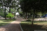The leafy Plaza Libertad in Villarrica. Paraguay, South America.