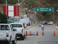 Larger version of Looking from the border at Macara in Ecuador across the bridge to Peru.