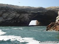 Islas Ballestas tunnel of rock. Peru, South America.